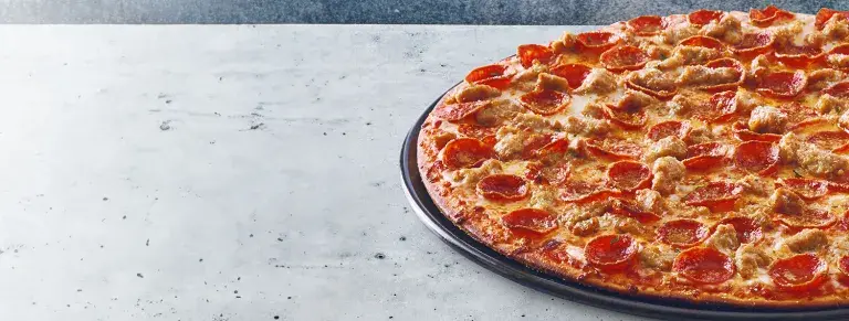 Donatos pizza with serious meat toppings