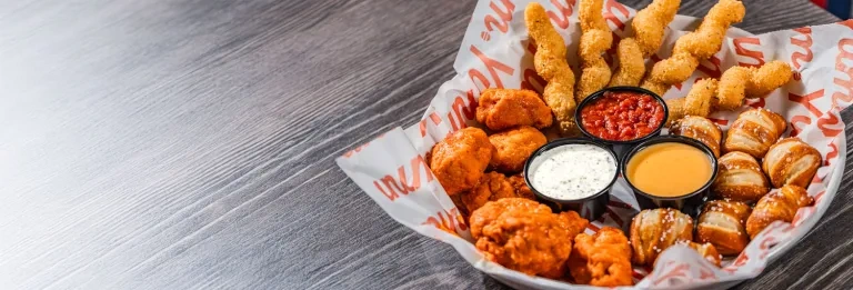 boneless buffalo wings mozzarella twists pretzels bites with assorted sauces